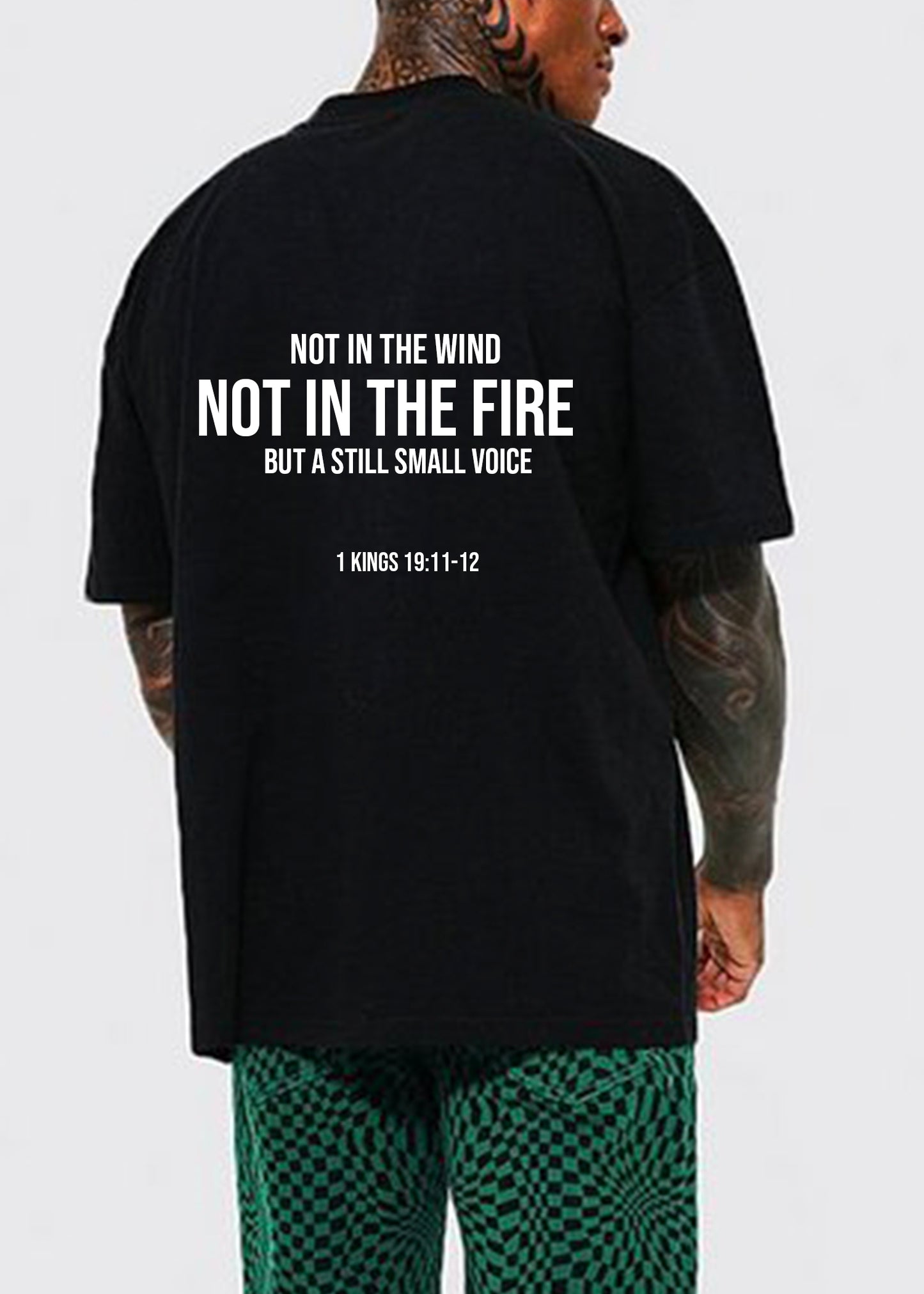 JESUS LOVES LAHAINA TEE - Backside: Not in the wind, not in the fire, but a still small voice - 1 Kings 19:11-12 | Support the victims from the 2023 Lahaina Fire with a Jesus Loves Lahaina T-shirt | Black tee with white screen print